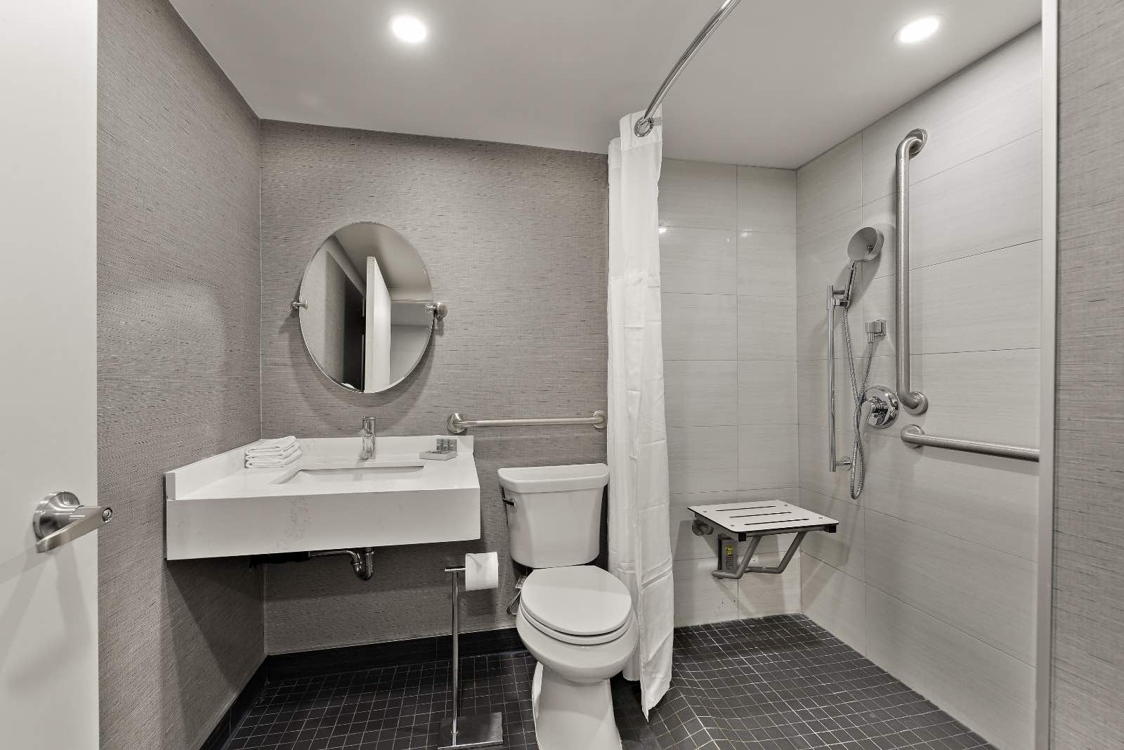 Best Western Parkway hotel room bathroom with sink, toilet and shower